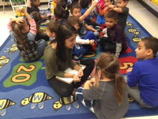 Senior Heidi Matias of Linda Mitten’s Early Childhood Workshop class works with first-graders at South Street Elementary School. Mitten’s students recently spent the day at the school to learn about early childhood education. Matias shadowed teacher Elisabete Mendes and her class.