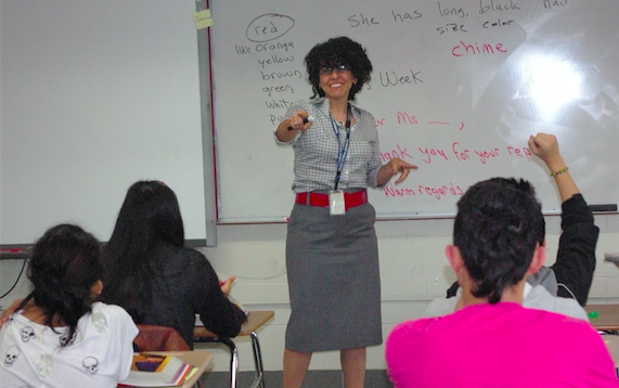 Soraya Bilbao works on a translation exercise with her ELL students. 