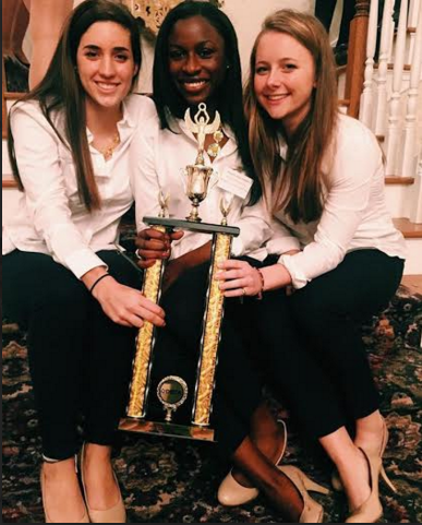 Danielle Reisert, Ndeyanta Jallow, and Mary Zanine pose for a picture.
