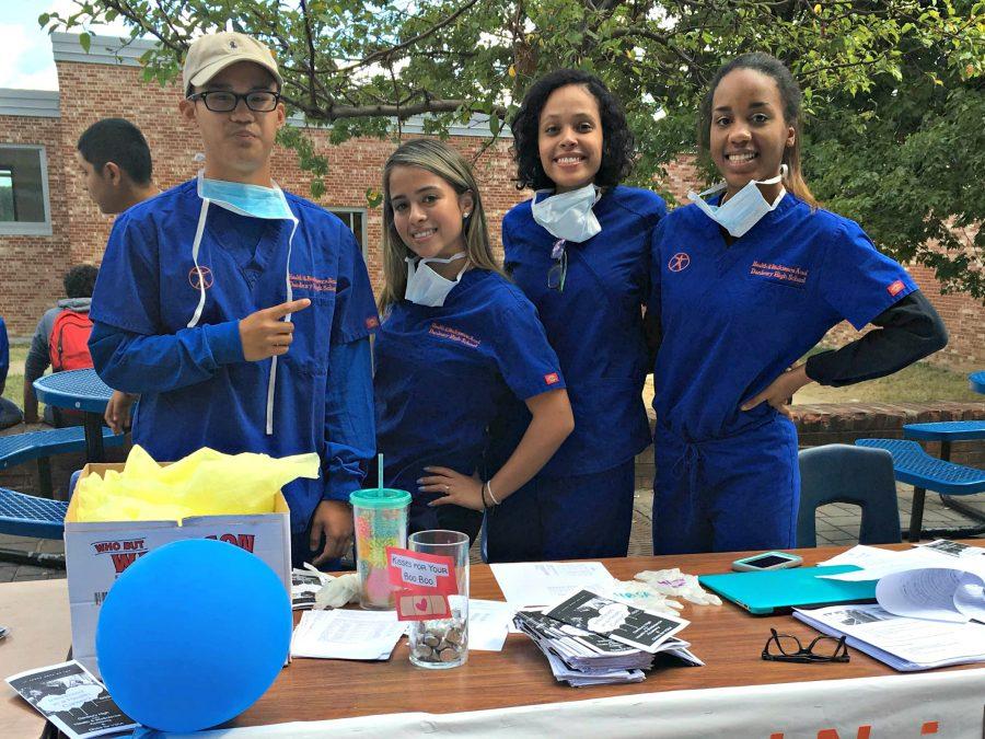 Members of DHSs various clubs played host to the 2016 Club Fair in the courtyard on Sept. 9. The clubs advertised their various missions to attract new members. Above are members of the Medical Club, below is the Diversity Club and at the bottom is the Math Club.