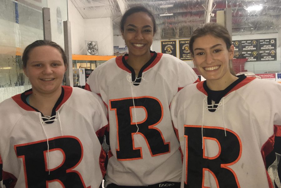 From left, juniors Cassandra Turner, Ciara Tonic and Olivia Alessandro are Danbury students playing for the Ridgefield girls hockey team.
