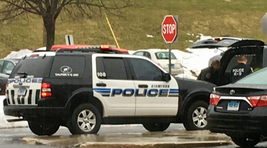 Police K-9 officers, administrators and safety advocates conducted a drug search of cars in the student parking lot on Feb. 5 during a lockdown drill.