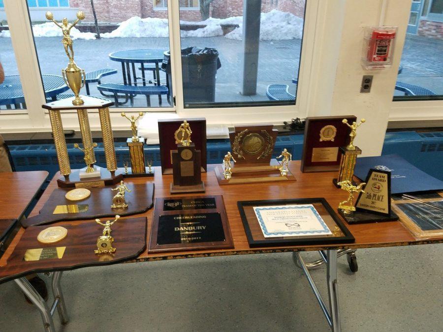 A+collection+of+some+of+the+trophies+won+by+our+winter+athletes.+Principal+Dan+Donovan+shared+this+photo+on+Twitter.