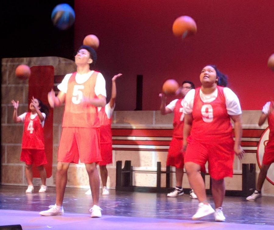 The cast of Disneys High School Musical runs through a number during Tuesdays dress rehearsal. The play opened today.