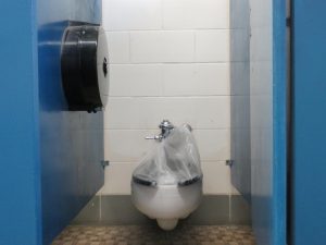 A toilet in the D1 girls bathroom remains out of action until the city repairs it. The delay in repairs to student bathrooms is due to an understaffed city maintenance department and insufficient budget.