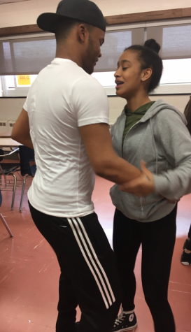 Yosuan Taveras and Yailin Peralta practice their dance moves before Friday's International Night.