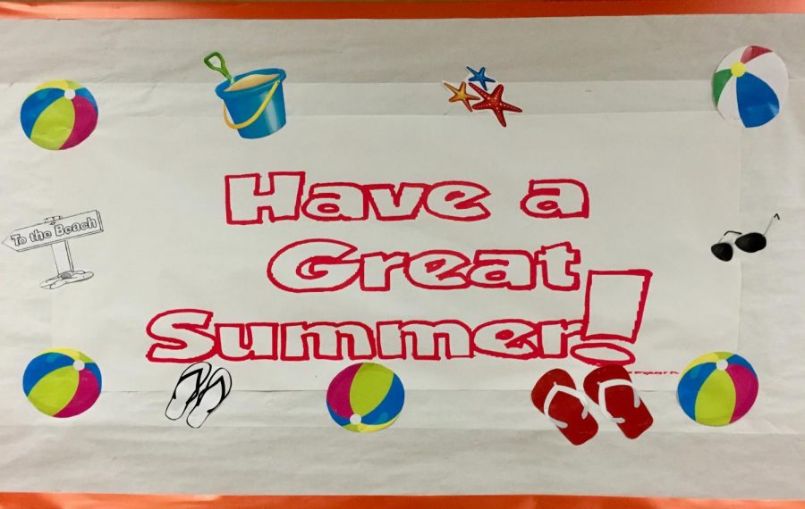 The bulletin board near the Main Office gives summer wishes.