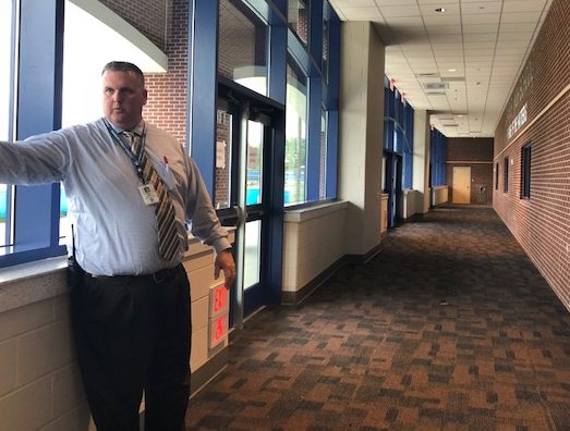Principal Dan Donovan, who once ran the Freshman Academy when housed in D4, proudly shows guests around the new academy, which will open for students this coming school year.