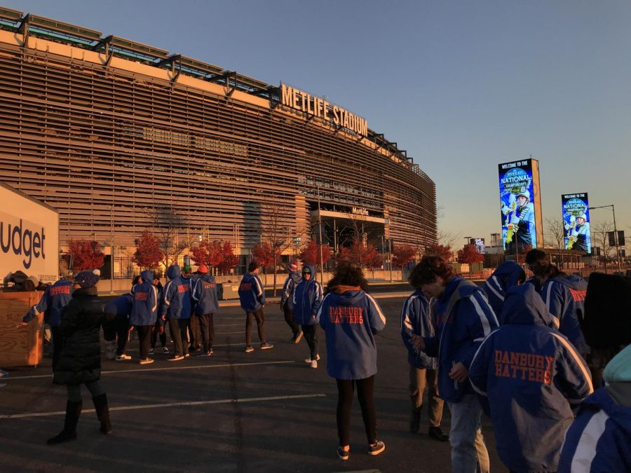 Members of the marching band wait outside of MetLife Stadium after their performance. 
