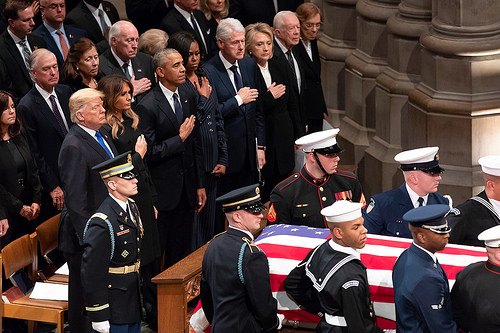 President Donald J. Trump and First Lady Melania Trump, joined by former President Barack Obama and First Lady Michelle Obama, former President Bill Clinton and First Lady Hillary Clinton and former President Jimmy Carter and First Lady Rosalynn Carter, watch as the casket of former President George H. W. Bush arrives to the funeral service Wednesday, Dec. 5, at the Washington National Cathedral in Washington, D.C