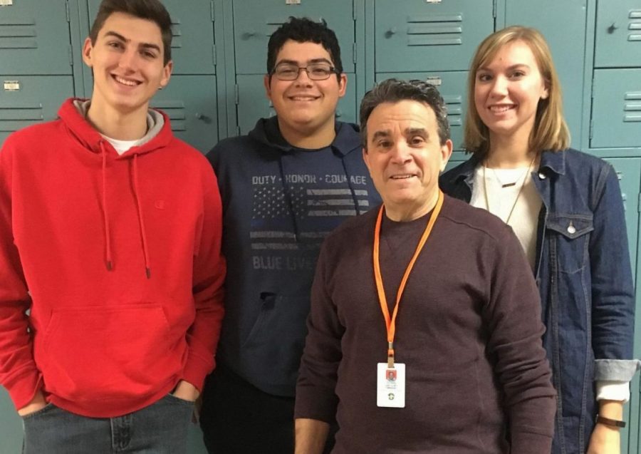 NVCC professor, Gregory Fimmano, stands with graduating students Theodore Hodgdon, Gabriel Campos, and Kayla Downs.