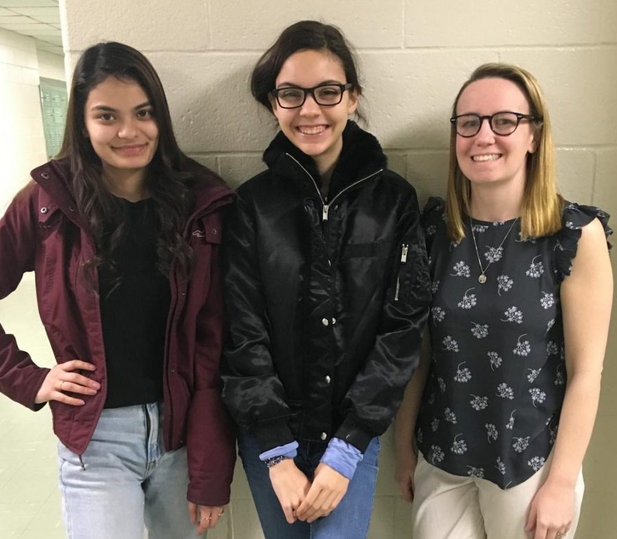 Teacher Elise Tobin, right, stands with winner Viktoria Wulff-Andersen, center, and runner-up Umama Mufti. Wulff-Andersen will go on to compete at the Connecticut State Finals on March 9.