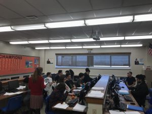 Computer science teacher Diane Mohs conducts class recently. She is awaiting new laptops to replace desktops damaged by water.