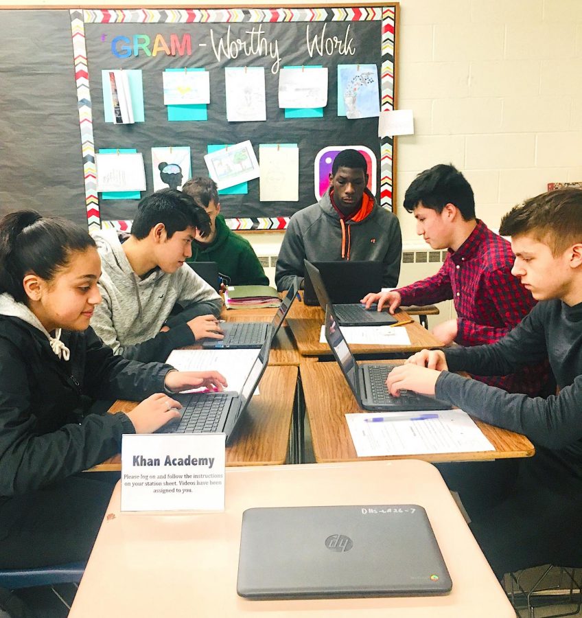 From left, juniors, Ashley Amigon, Anthony Salinas, Nicholas Alfidi, Masta Joyner, John Rodriguez-Galarza, and Cameron Tate in Alexandrea Plantes English III class use new Chromebooks to work on a Khan Academy exercise during class. 