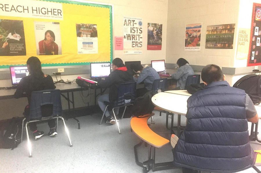 Students work on researching colleges, scholarships and the application process at the Career Center. 