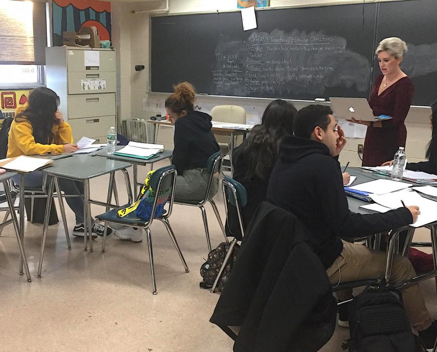 Stacey Brugnolo, head of the ELL department and transitional English teacher, recently conducts class.