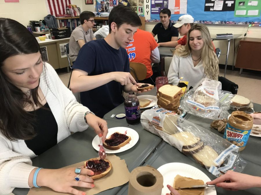 Mrs. Passarellis Contemporary Issues class makes bagged lunches for a homeless shelter on Friday, May 17th.