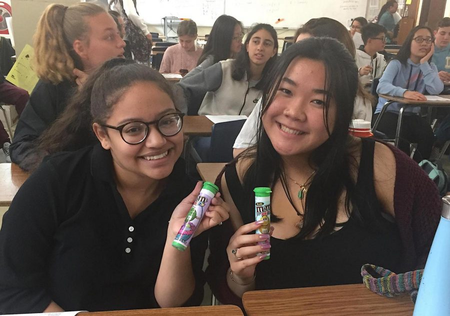 DHS Key Club members Audrey Hinh, left, and Penelope Peralta are happy with the clubs fund-raising efforts for the Thirst Project.