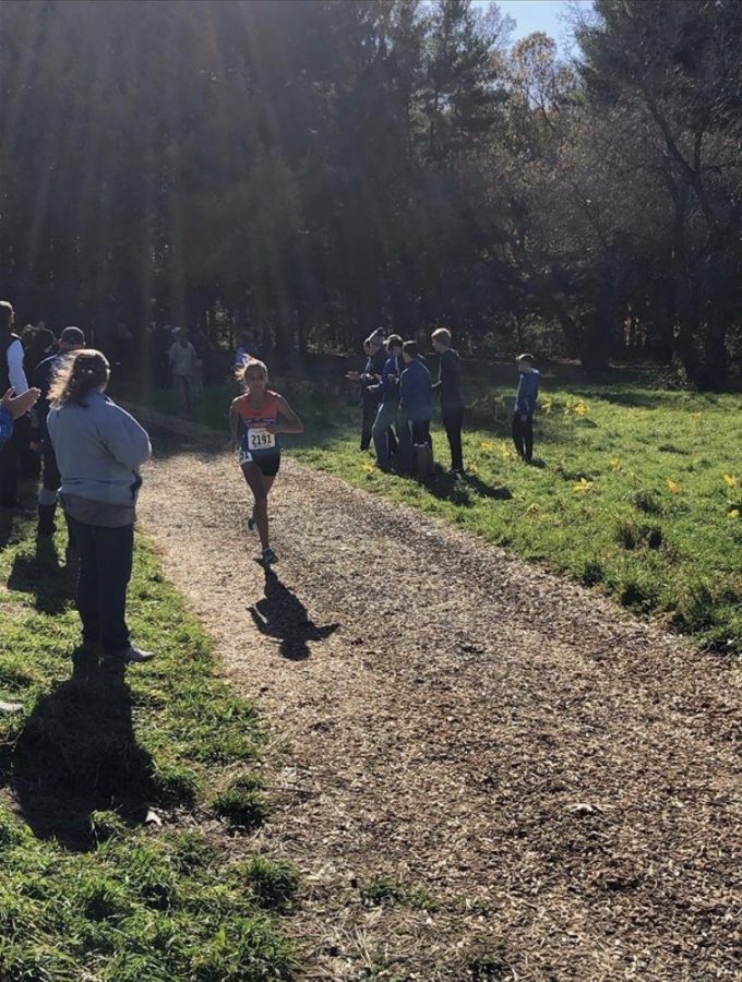 Daniella running at the Class LL state meet.