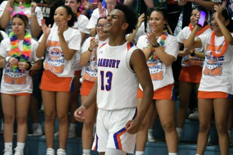Senior forward Christian Jeffers (13) celebrating a huge victory for the Hatters to remain undefeated